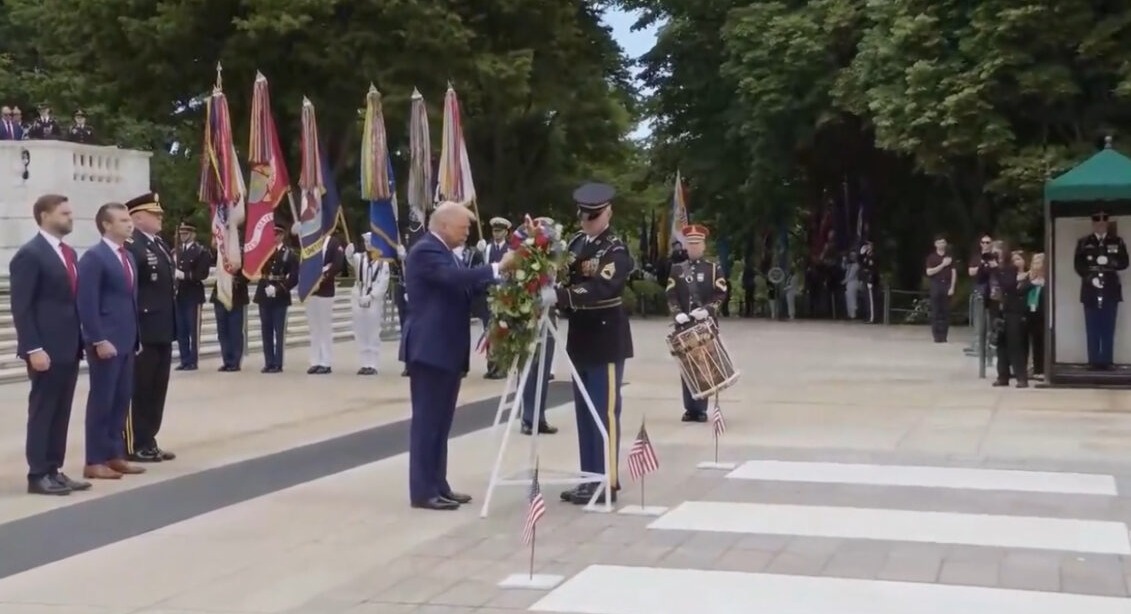 President Donald Trump and Vice President JD Vance salute in the amphitheatre at the Tomb of the Unknown Soldier in Arlington National Cemetery in Arlington, Va., on Memorial Day,